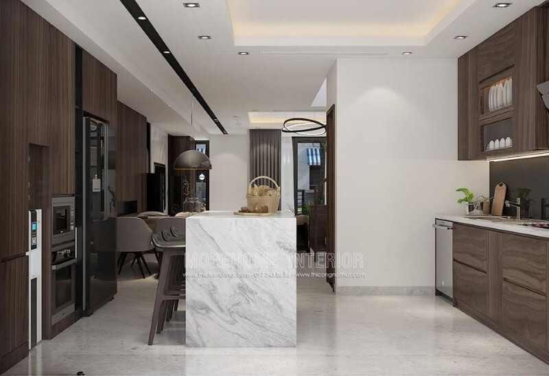 Tủ bếp gỗ sậm màu sậm màu kết hợp bàn đảo ốp đá tạo nên vẻ đẹp sang trọng cuốn hút cho phòng bếp.