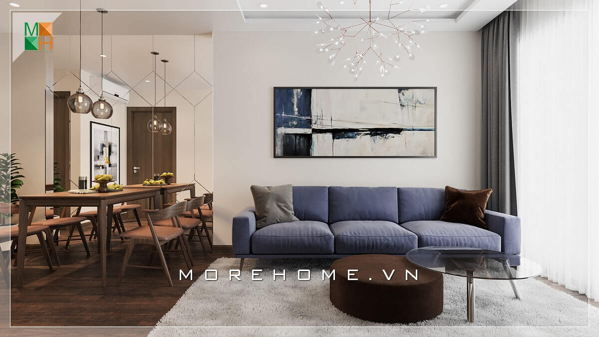 Mẫu thiết kế phòng ăn liền phòng khách, với bộ bàn ăn sử dụng gỗ tự nhiên phong cách hiện đại tối giản, kết hợp cùng ghế sofa văng bọc nỉ, mang lại không gian sinh hoạt trẻ trung hiện đại cho gia chủ Mẫu nội thất chung cư hiện đại